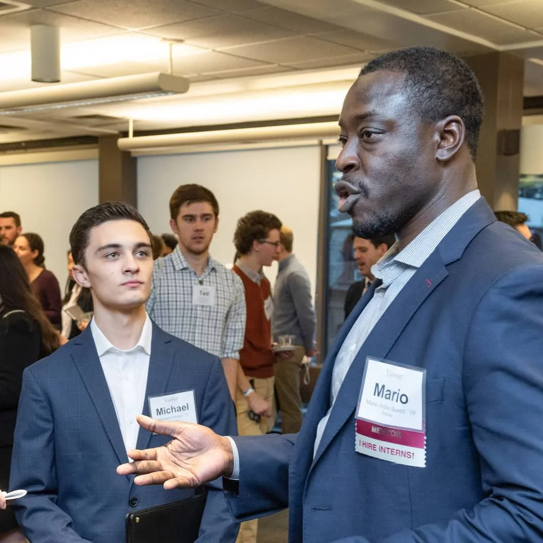 Mentor talking to students
