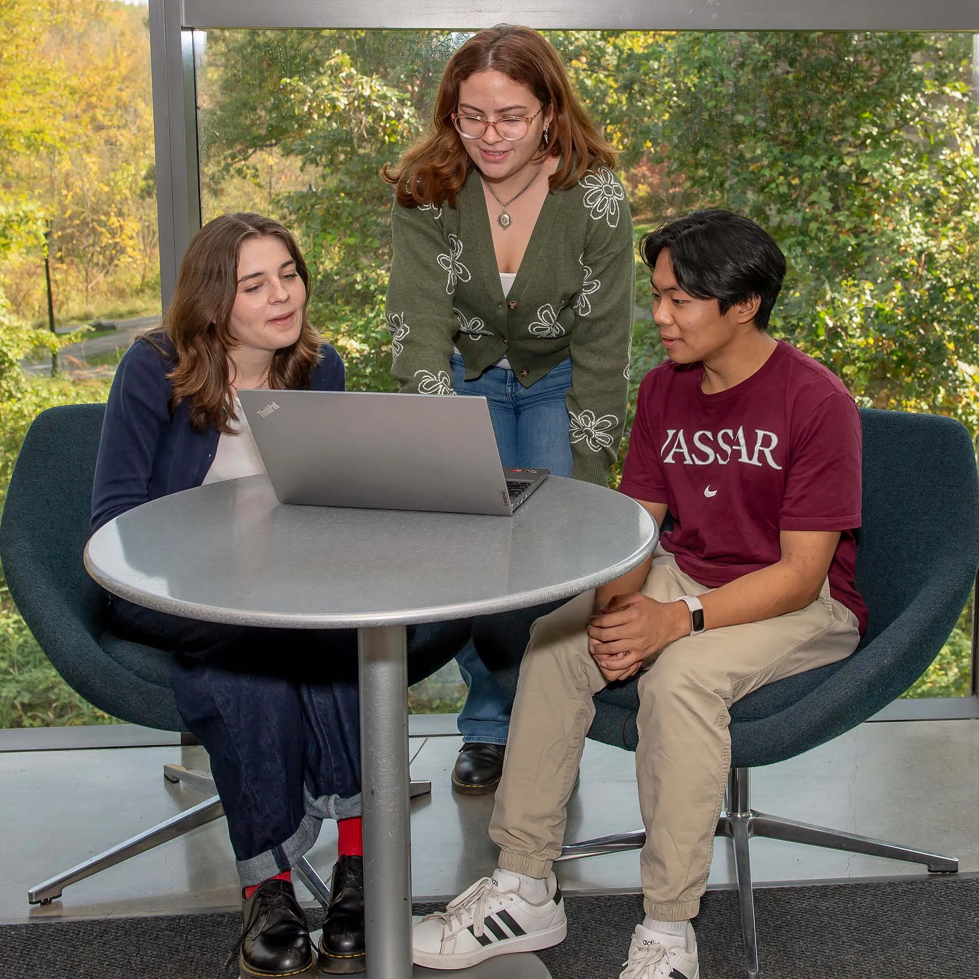 Students doing school work on campus.