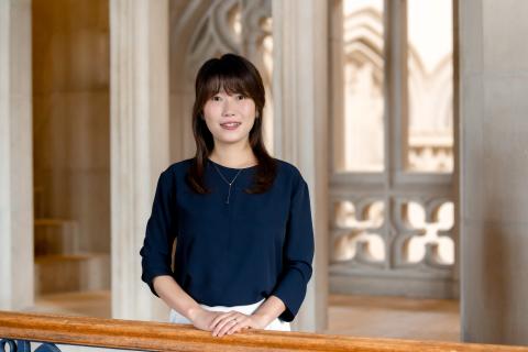 Portrait of a person with the Vassar Library in the background.
