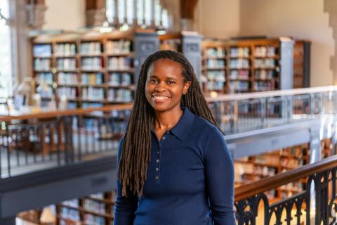 Photo of Whitney Fields in a library.