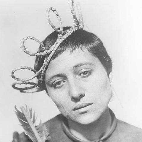 a black-and-white still from the 1928 silent film "Joan of Arc" featuring a closeup of the character Joan.