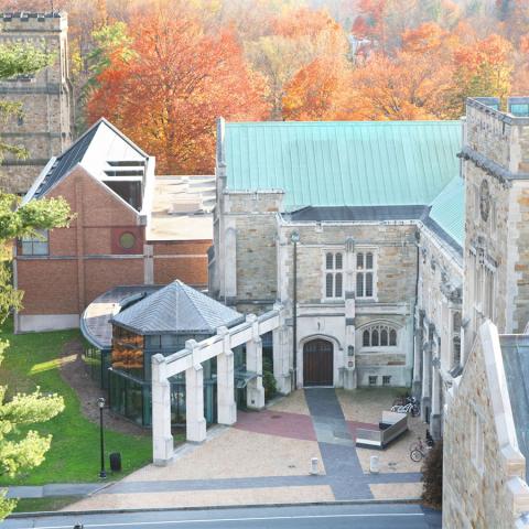 An aerial view of the entrance to the Loeb Art Center with fall foliage.