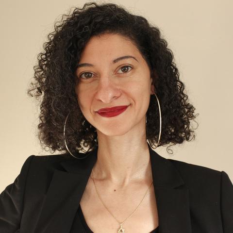 headshot of Dr. Chanda Prescod-Weinstein, author and assistant professor of physics and astronomy at the University of New Hampshire 