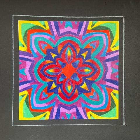 Square kaleidoscope design with pink, purple, blue, green, yellow and aqua colors in various patterns.   