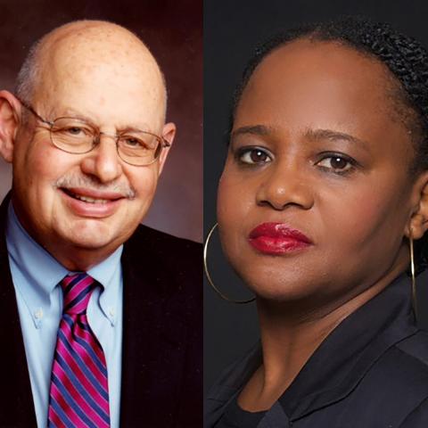 Dr. Daniel Aronzon wearing a black jacket, blue shirt and red tie and Edwidge Danticat wearing a black shirt. 