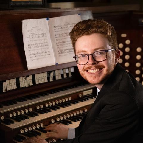 Person sitting at the organ