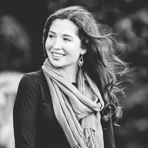 Black and white portrait of subject.