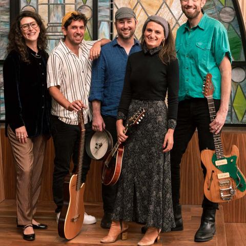 Portrait of ensemble with five people.