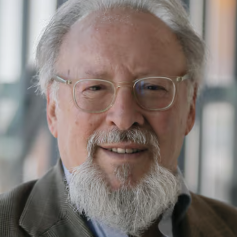 Subject smiling and looking directly at the camera.