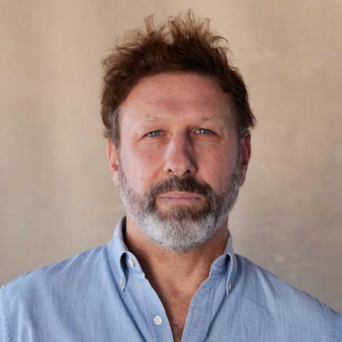 Headshot of Adam Ross.