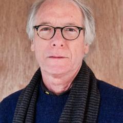 A portrait photo of Professor Emeritus of English Paul Kane.